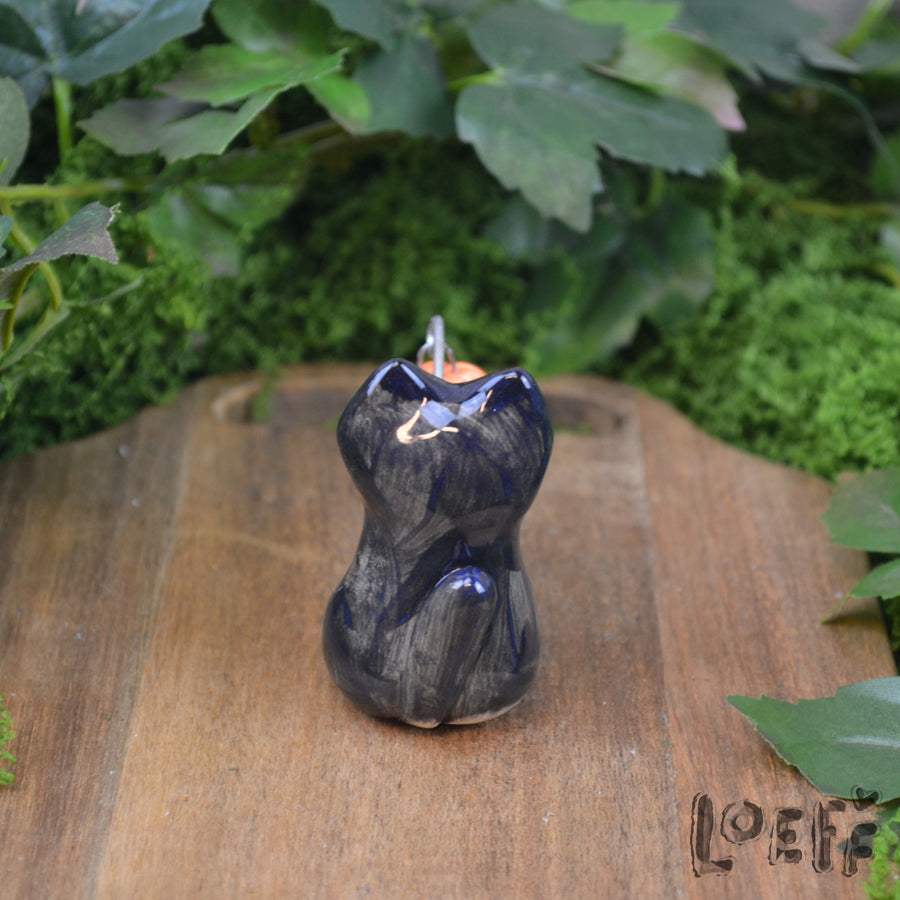 Tiny Black Cat with Jack o' Lantern
