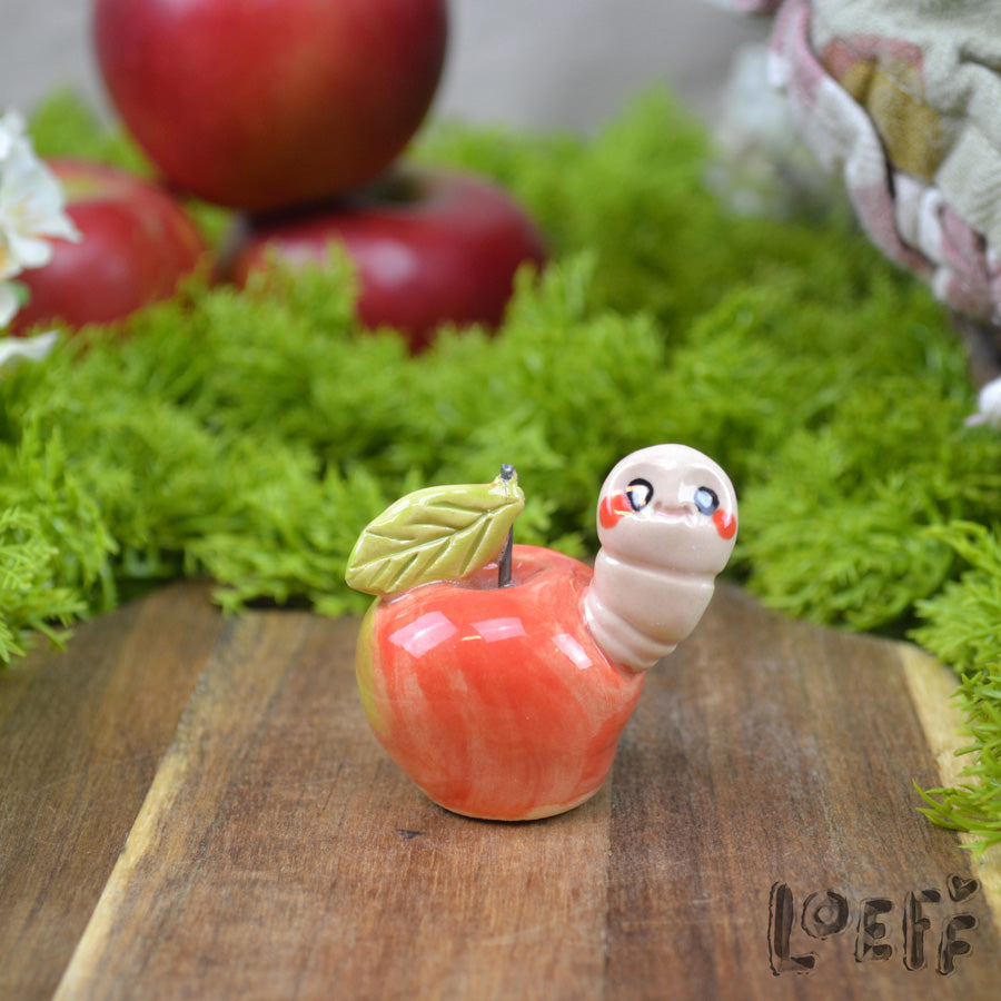 Tiny Apple with Worm